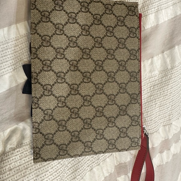 Gucci wristlet small clutch. Never worn. - Picture 3 of 3